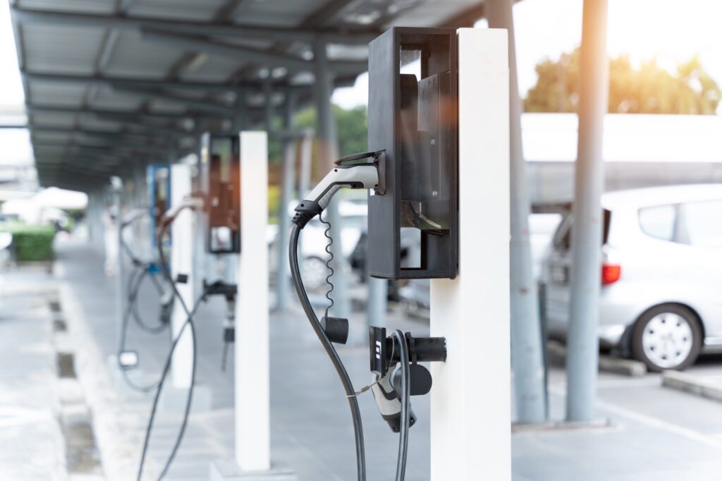 Electric car on electric car charging station. Power supply for electric car charging.